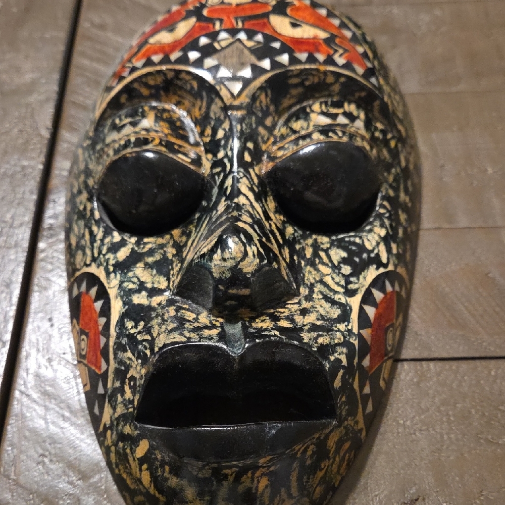 Handcrafted Tribal Mask with Black and Red Accents